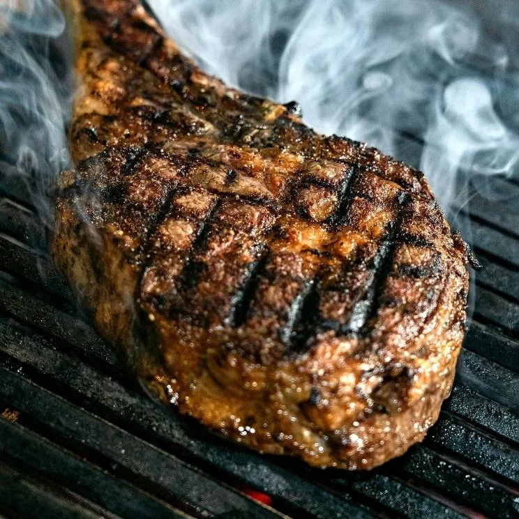 Smoked meats on a barbecue pit